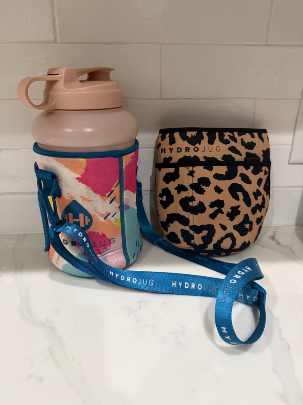 HydroJug Bottle with Blush Lid, Teal Strap & Colorful Sleeve plus extra leopard